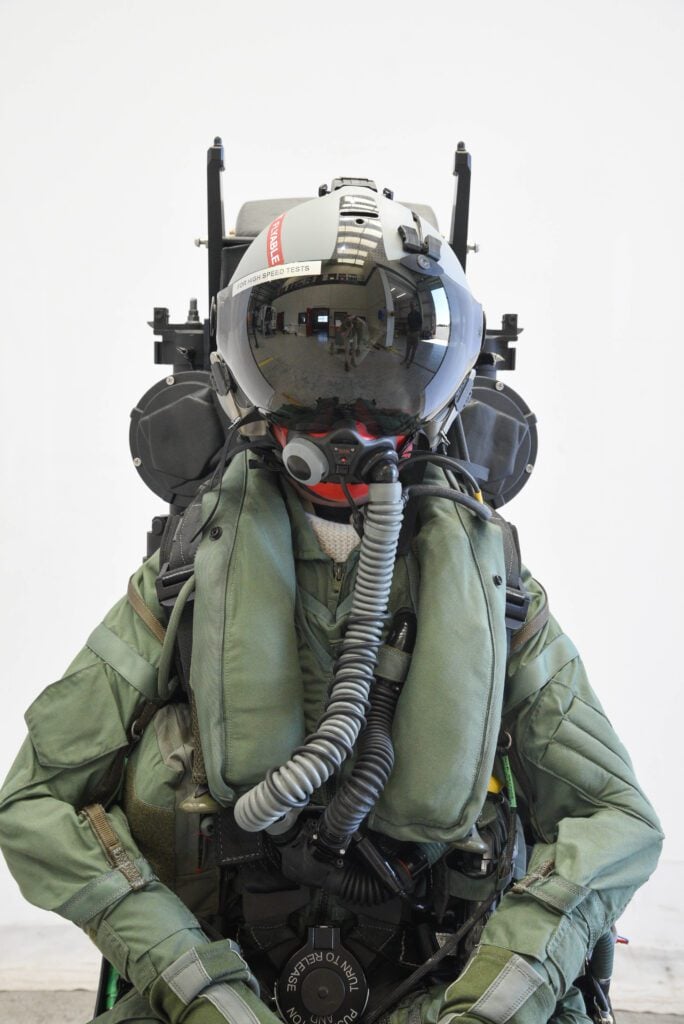 Test manikin suited in full aircrew flight equipment strapped into a KR18A ejection seat